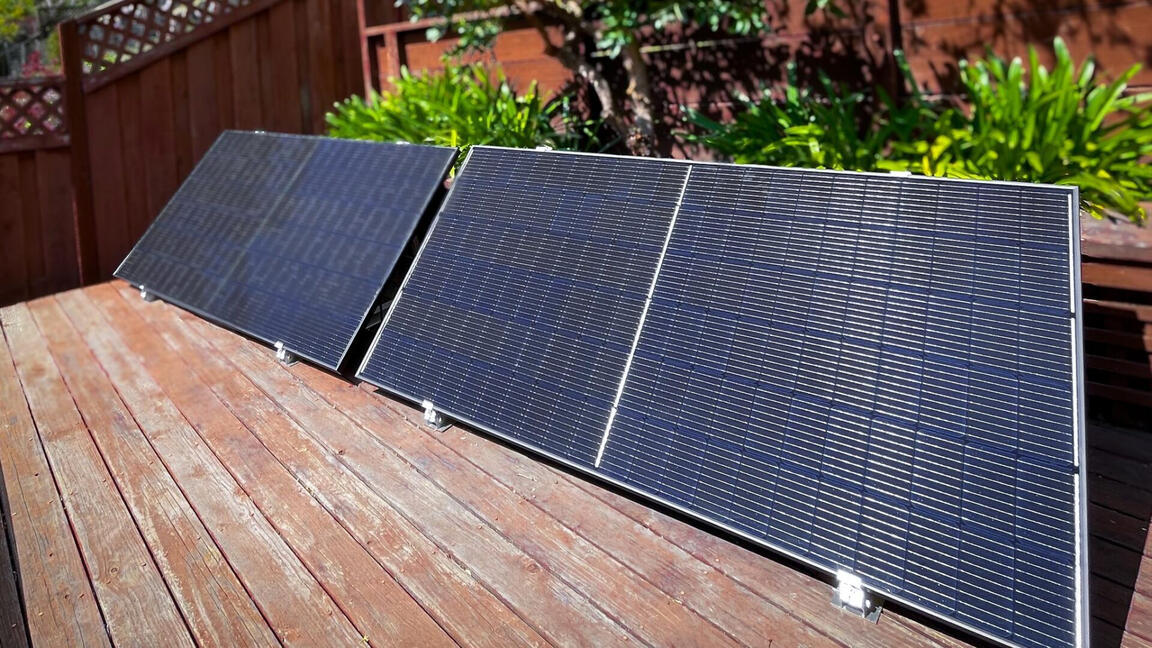 Plug-in solar - photo credit https://solarunitedneighbors.org/resources/what-to-know-about-plug-in-solar/ Plug-in solar panels sitting on a deck